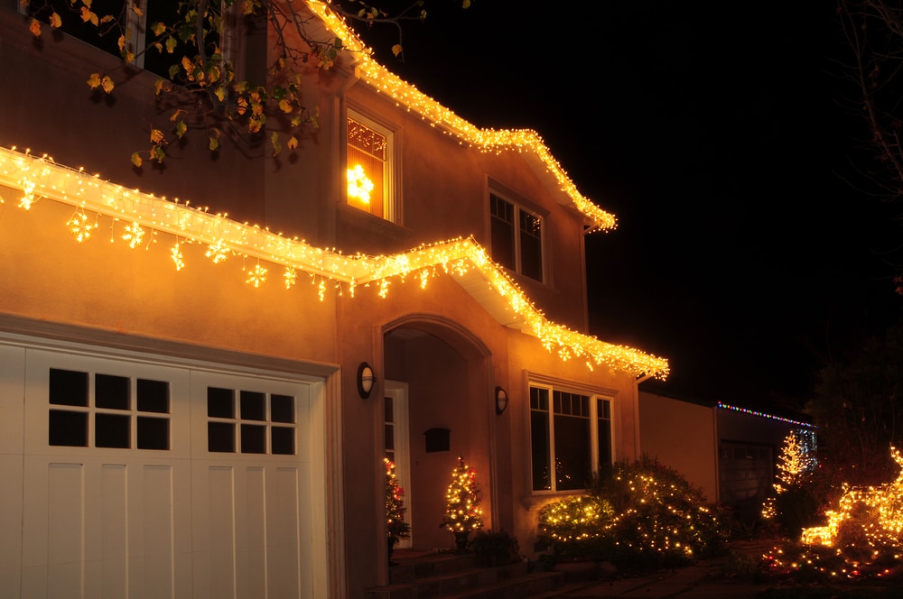 Garage Door and front of home lit for Christmas